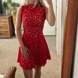 Francesca’s red lace cocktail dress